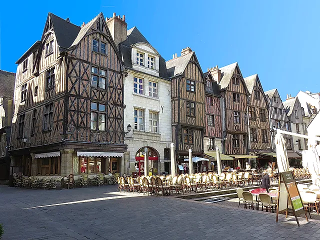 Half-timbered houses and café terraces on Place Plumereau in Tours